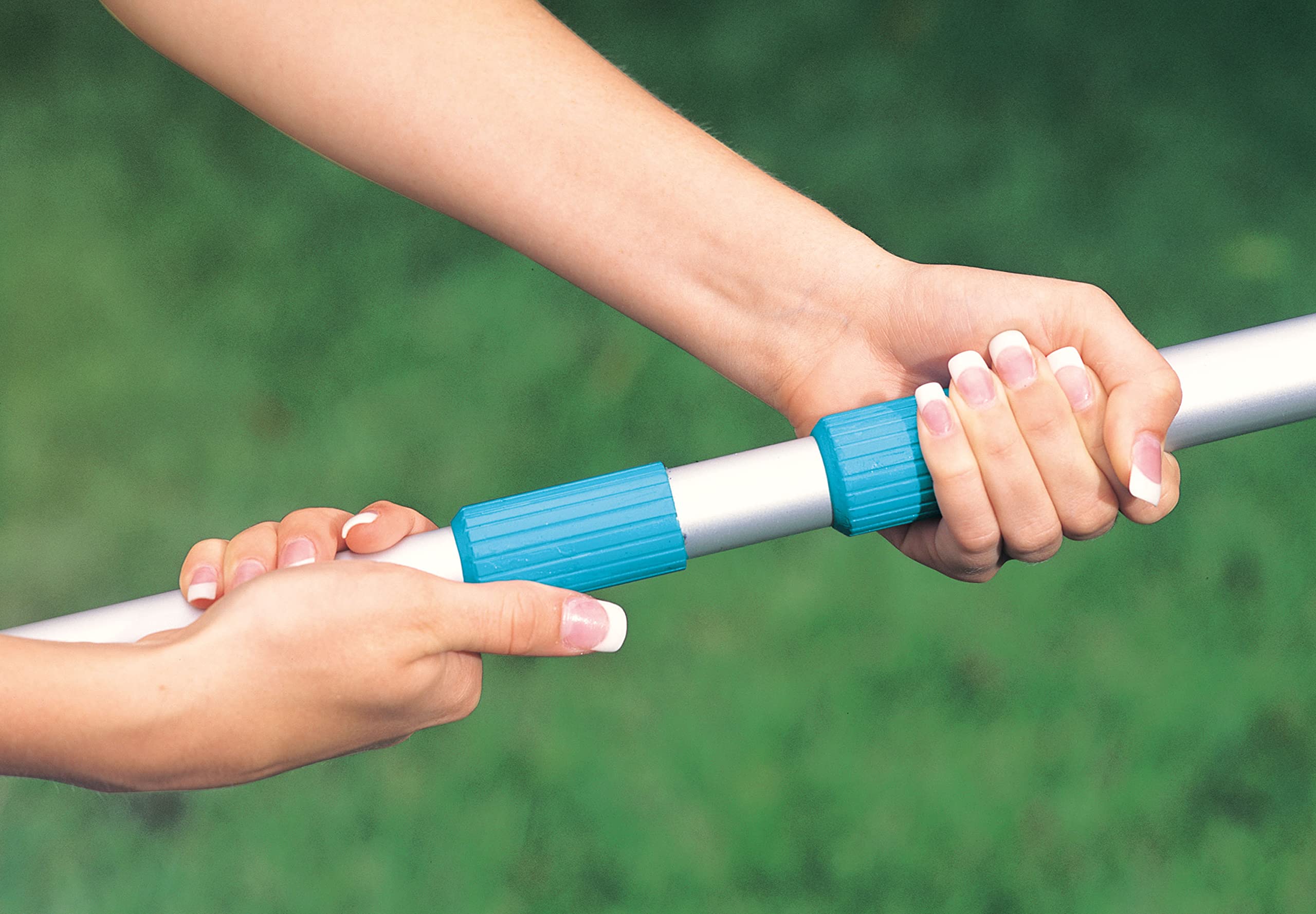 Hands extending the Intex telescoping aluminum pole by its teal collar