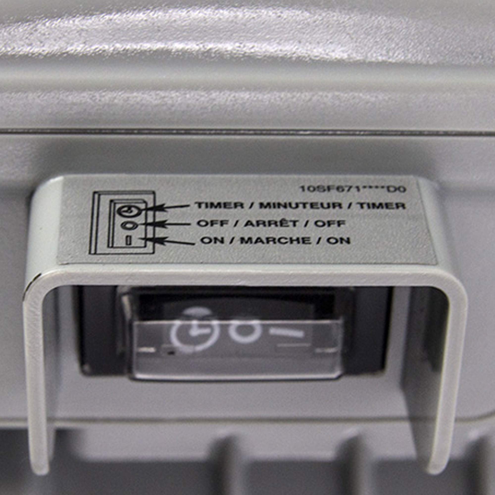 Close-up of the Intex sand filter pump timer switch with timer, off and on settings