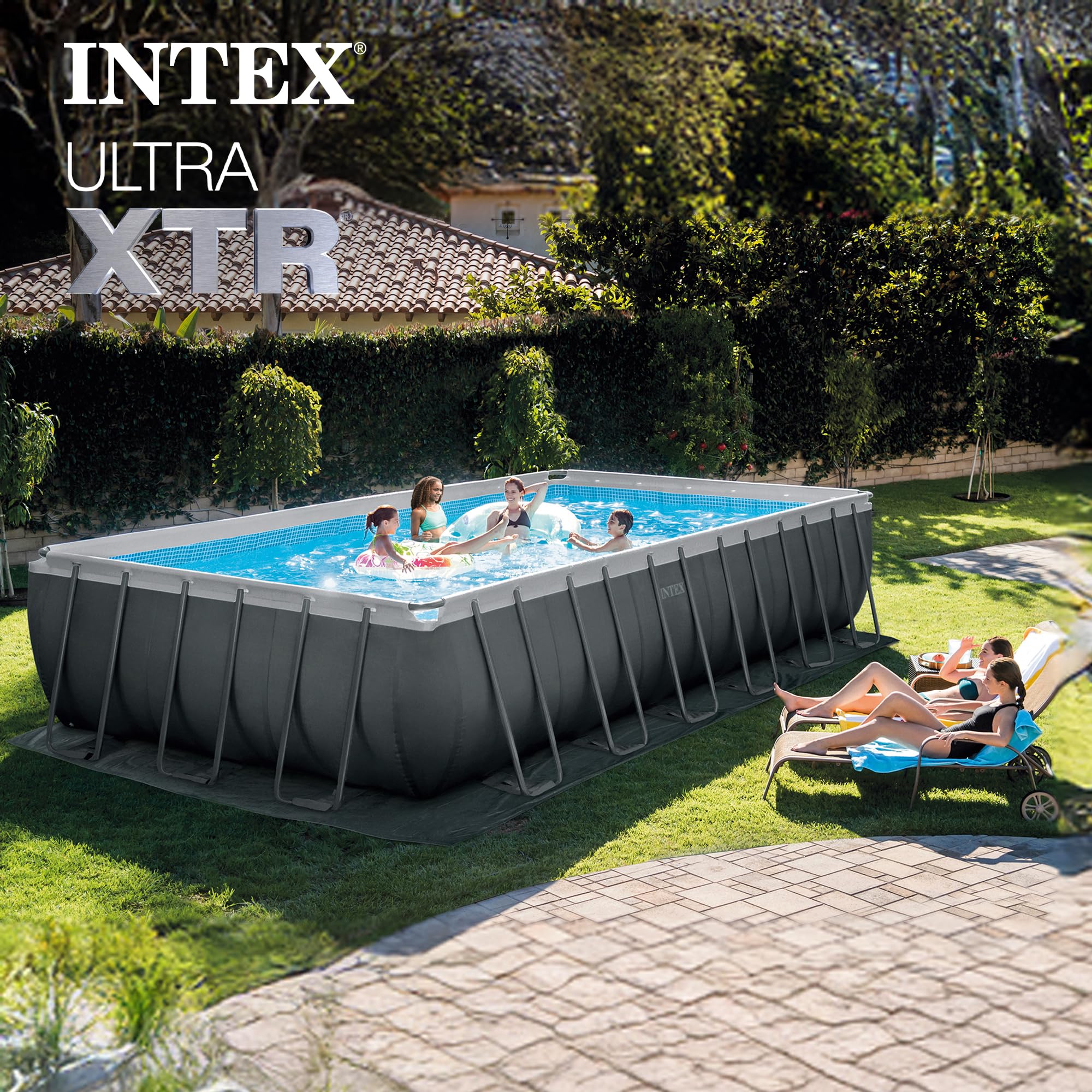 Family swimming in the Intex Ultra XTR rectangular above-ground pool in a backyard